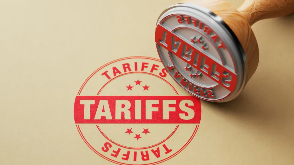 A stamp with the words tariffs