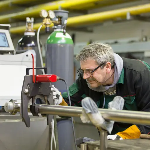 Operator checking a machine functioning