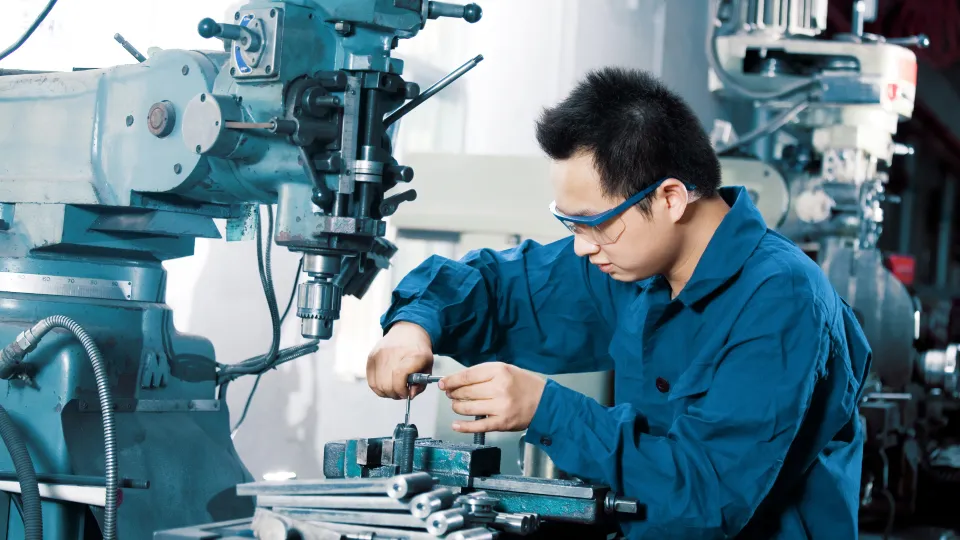 An Spanish industrial equipment worker at work